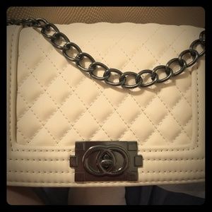 White hand bag